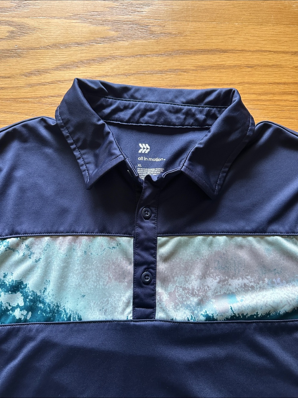 all in motion Navy Polo with Teal and Aqua Chest Stripe